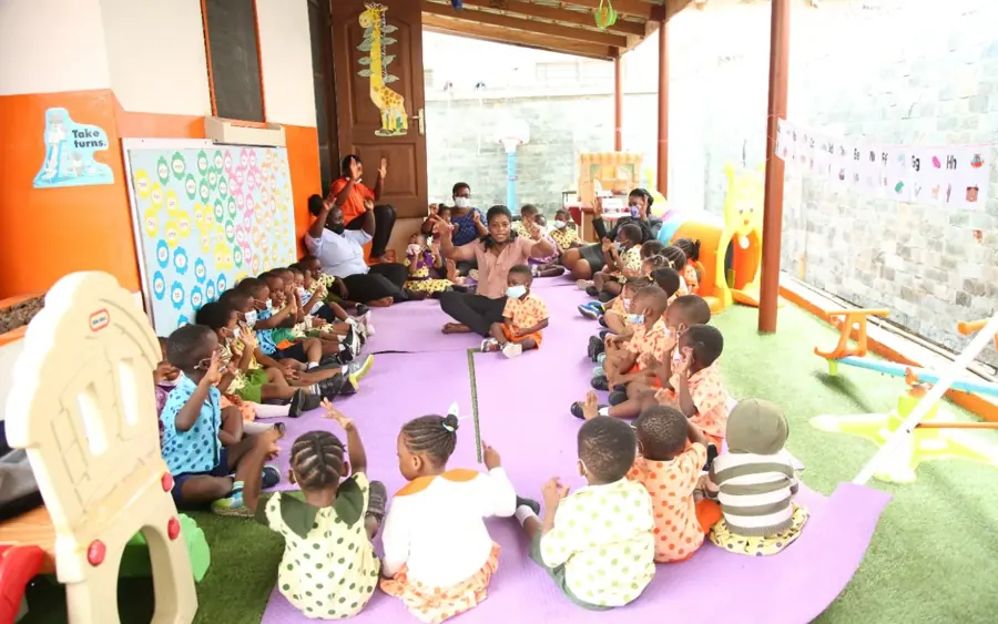 Children gathered together for a story and song session